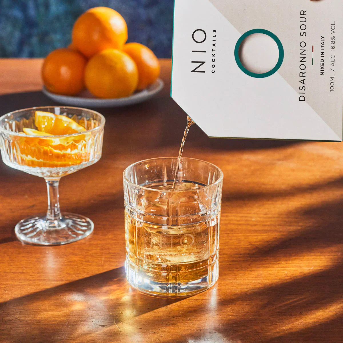 nio cocktails disaronno sour poured